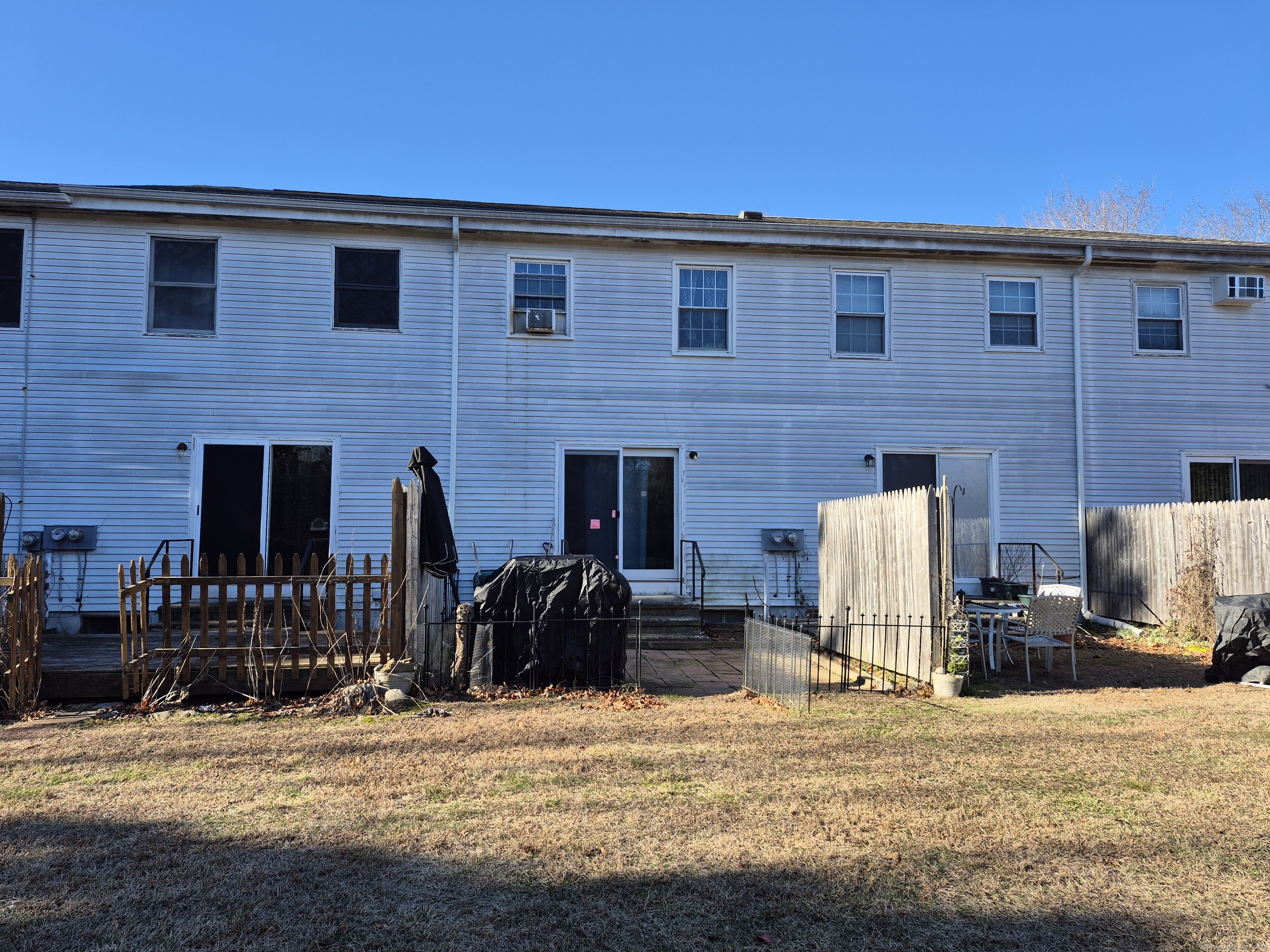74 Athol Street, Unit 74 Killingly, CT 06239 - Photo 4 of 15 a view of a house with outdoor space