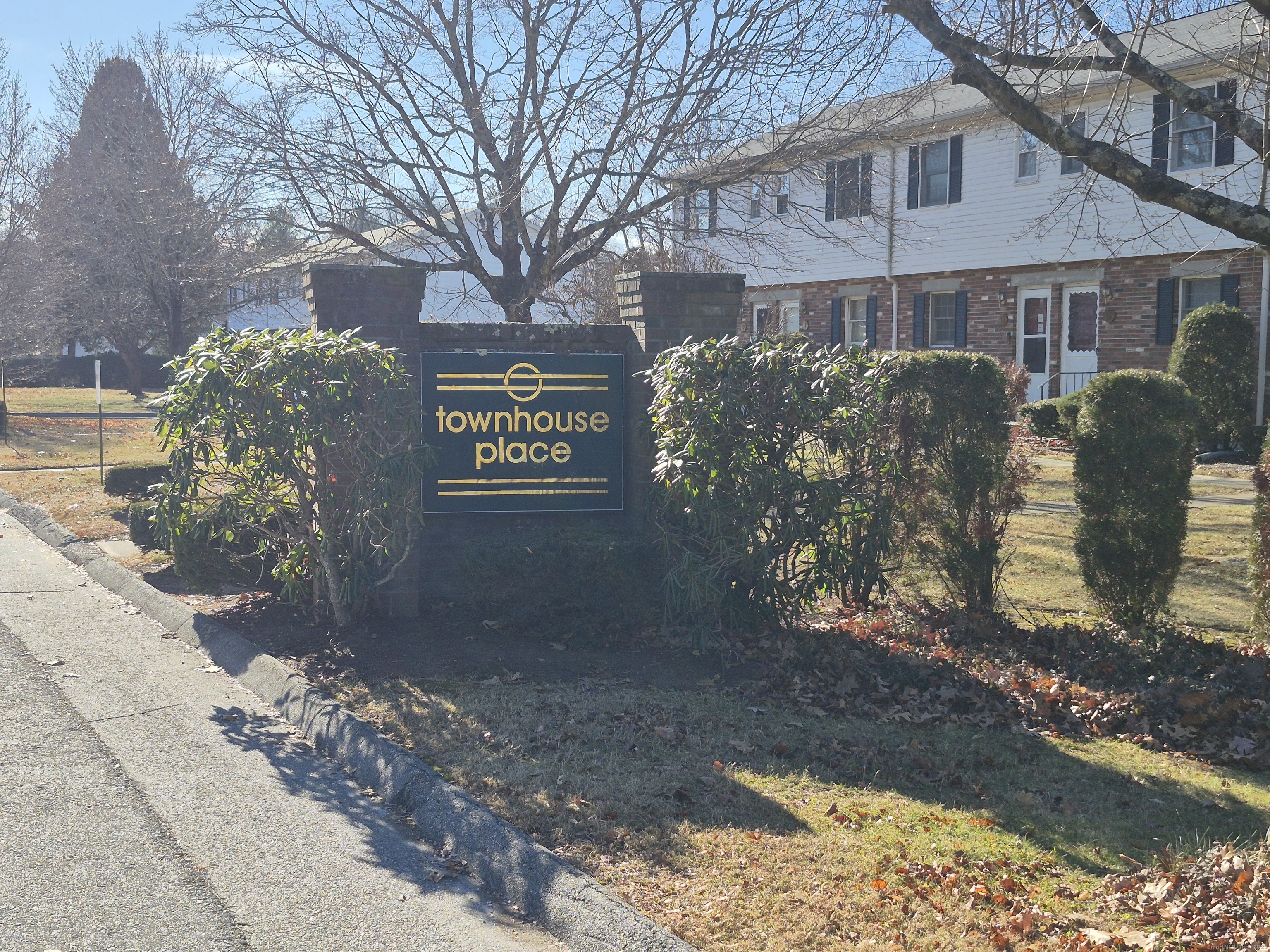 74 Athol Street, Unit 74 Killingly, CT 06239 - Photo 5 of 15 a view of a street with potted plants