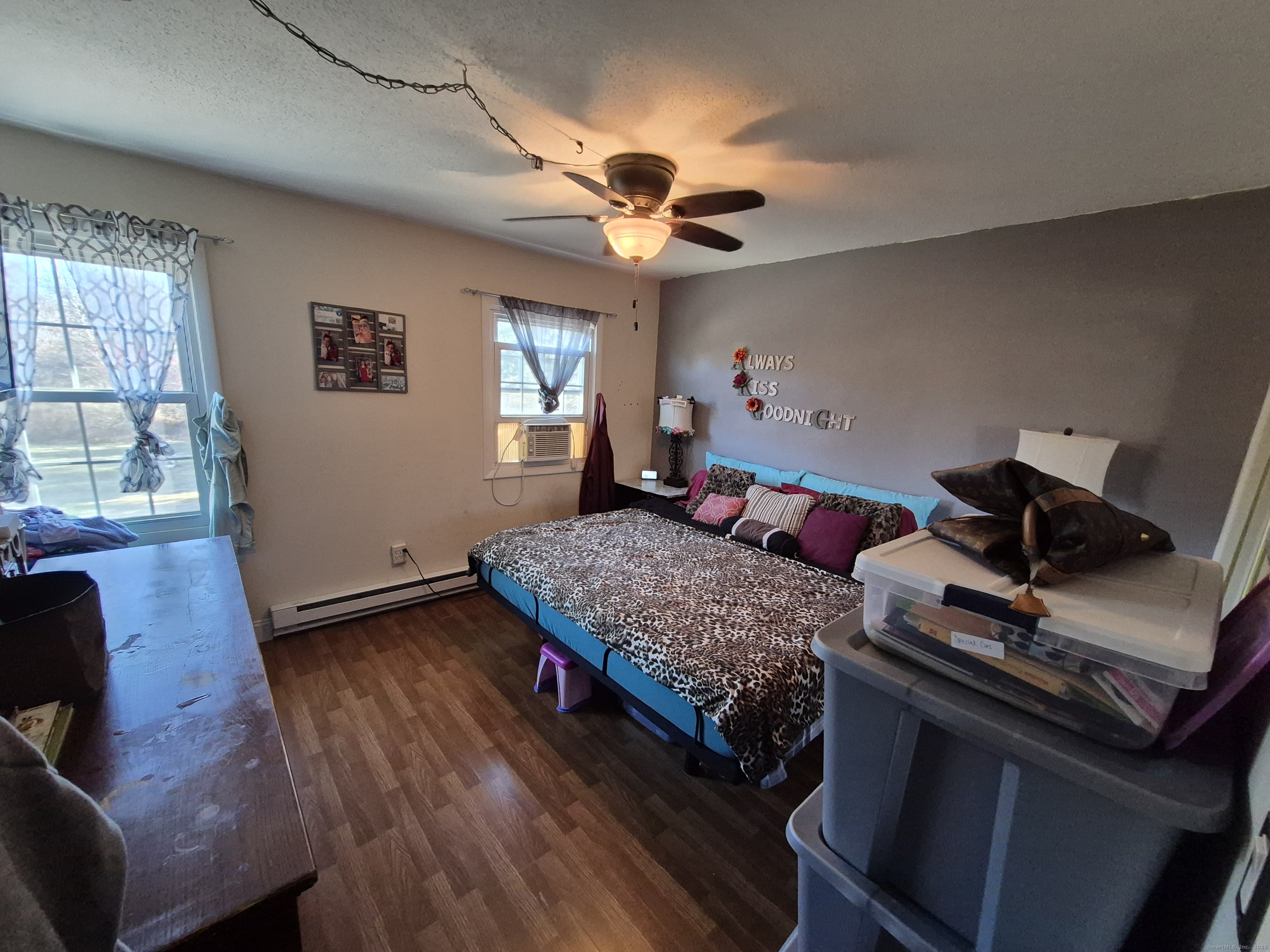 74 Athol Street, Unit 74 Killingly, CT 06239 - Photo 9 of 15 a living room with furniture and a window