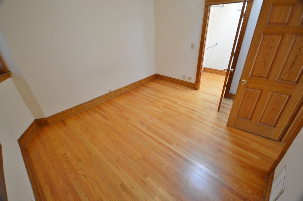 713 West Wrightwood Avenue, Unit 2R Chicago, IL 60614 - Photo 7 of 8 a view of empty room with wooden floor