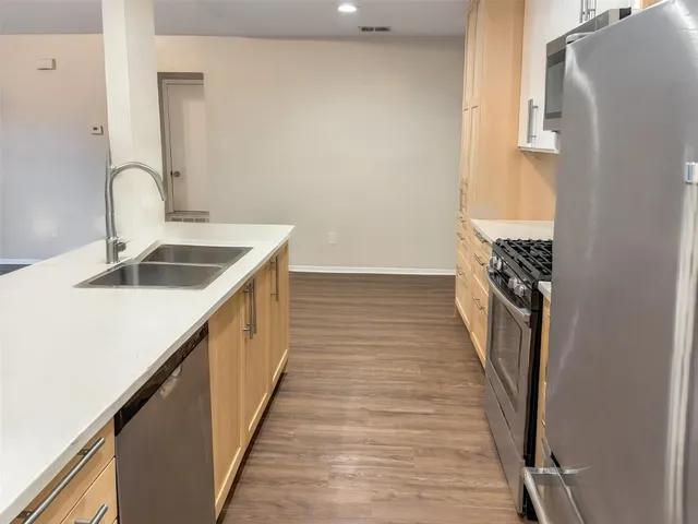 a bathroom with a sink a vanity and mirror