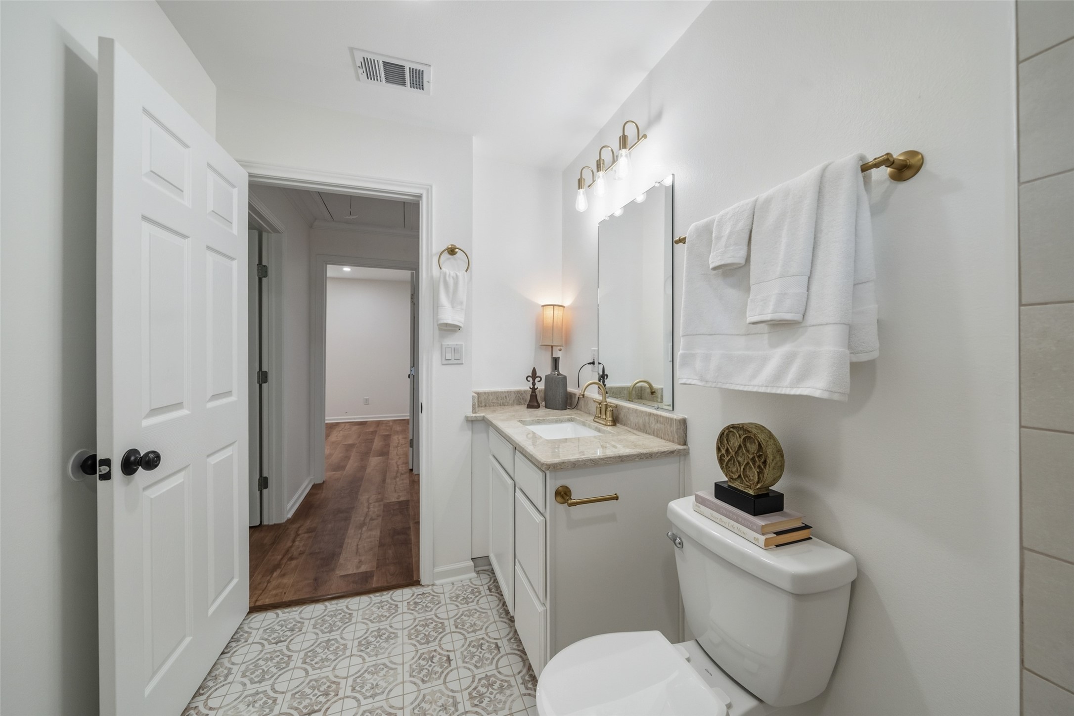 3051 Rothermel Road Houston, TX 77093 - Photo 20 of 24 Explore the inviting guest bathroom, featuring elegant fixtures and a modern design.