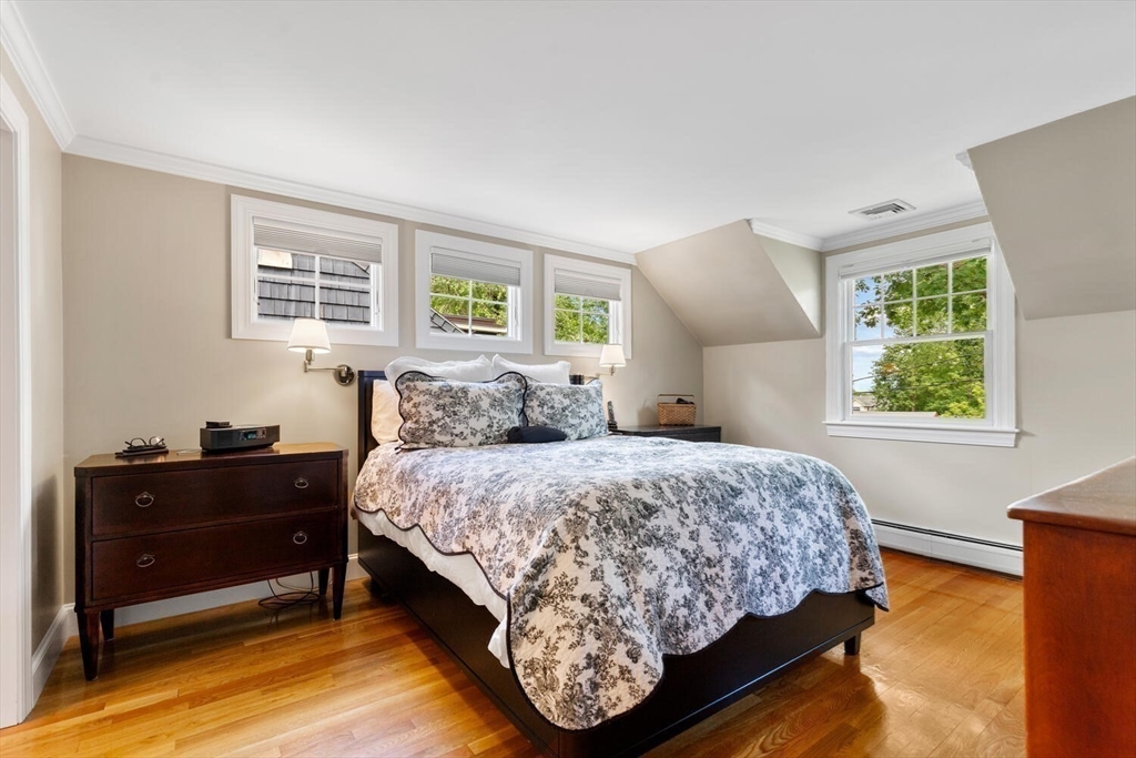 11 Nichols Road Lexington, MA 02420 - Photo 15 of 30 a bedroom with a bed and window