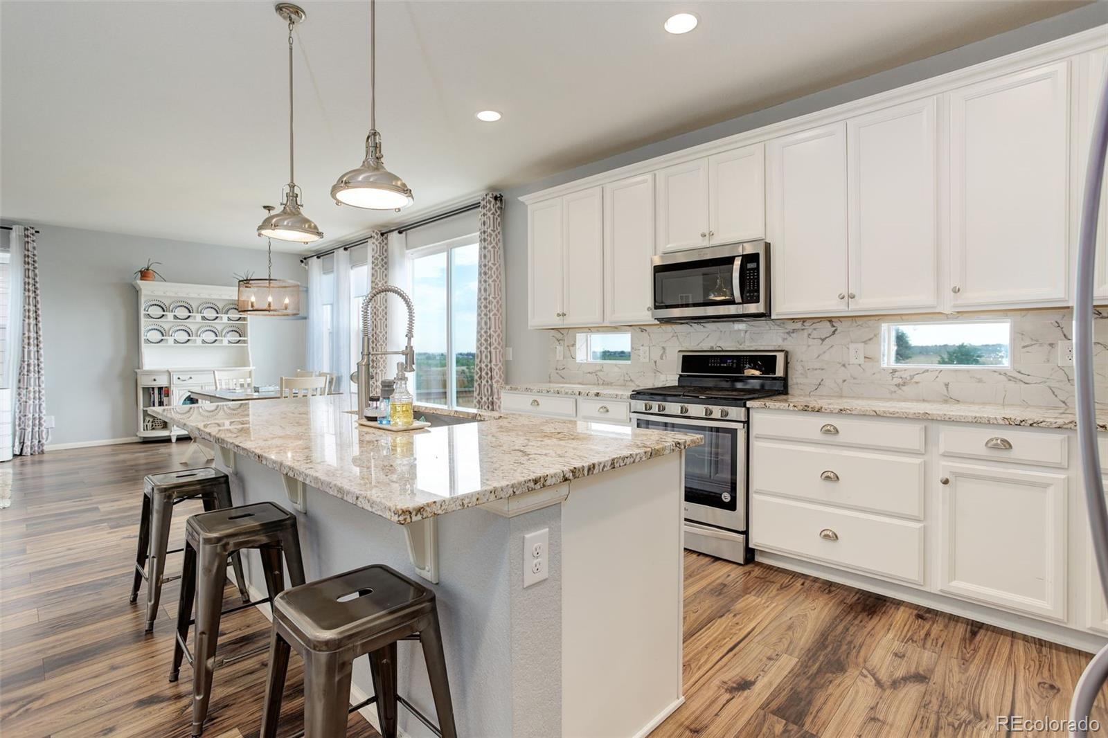 11038 Unity Lane Commerce City, CO 80022 - Photo 1 of 48