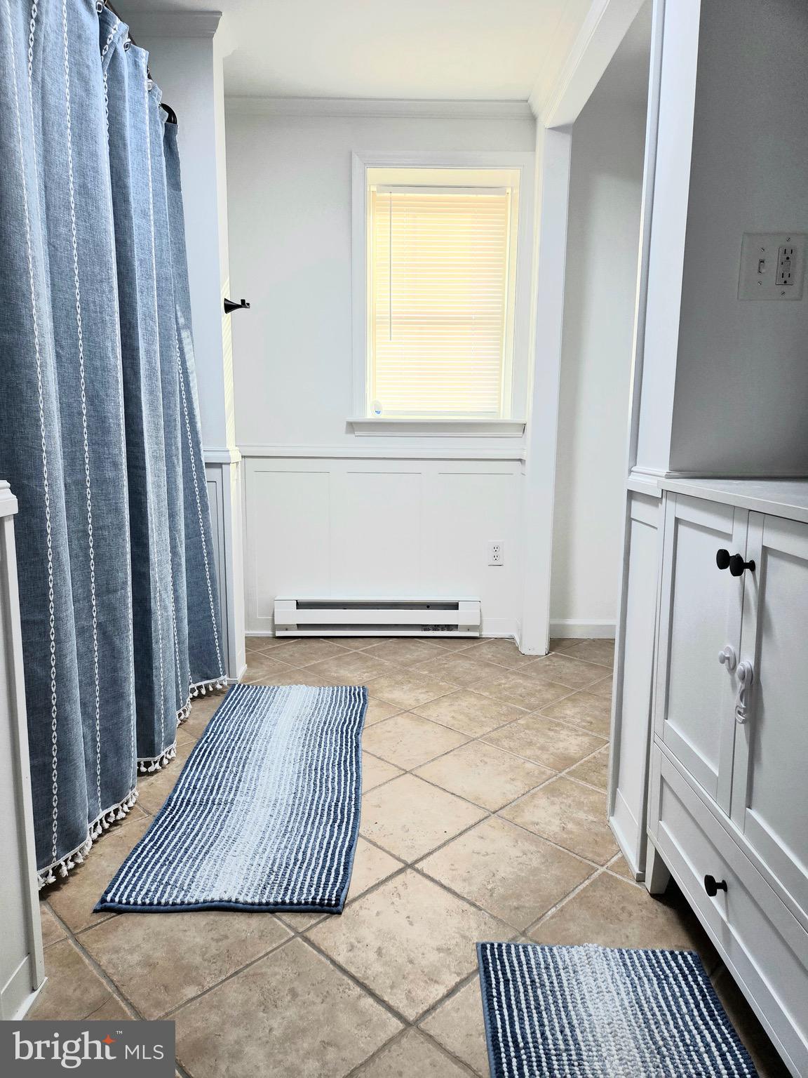 927 Susquehanna Road Madison, MD 21648 - Photo 23 of 26 a view of a room with wooden floor and white walls