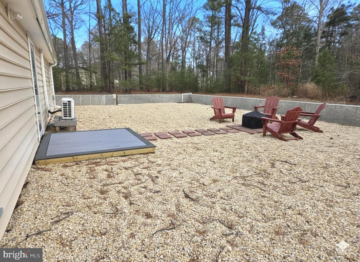 927 Susquehanna Road Madison, MD 21648 - Photo 4 of 26 a view of a backyard with sitting area