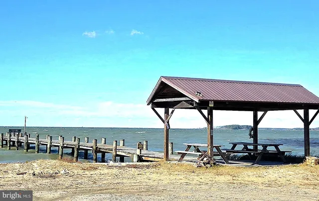 a view of a swimming pool with an ocean view