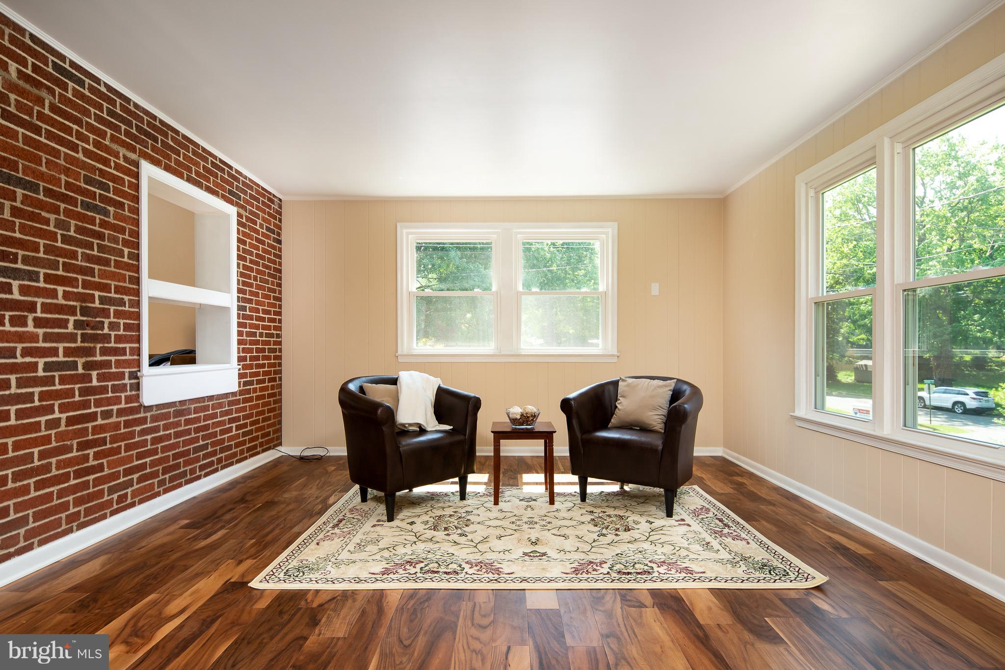 146 Frazier Road Warrenton, VA 20186 - Photo 12 of 27 Family Room-Brick wall adds character and charm.