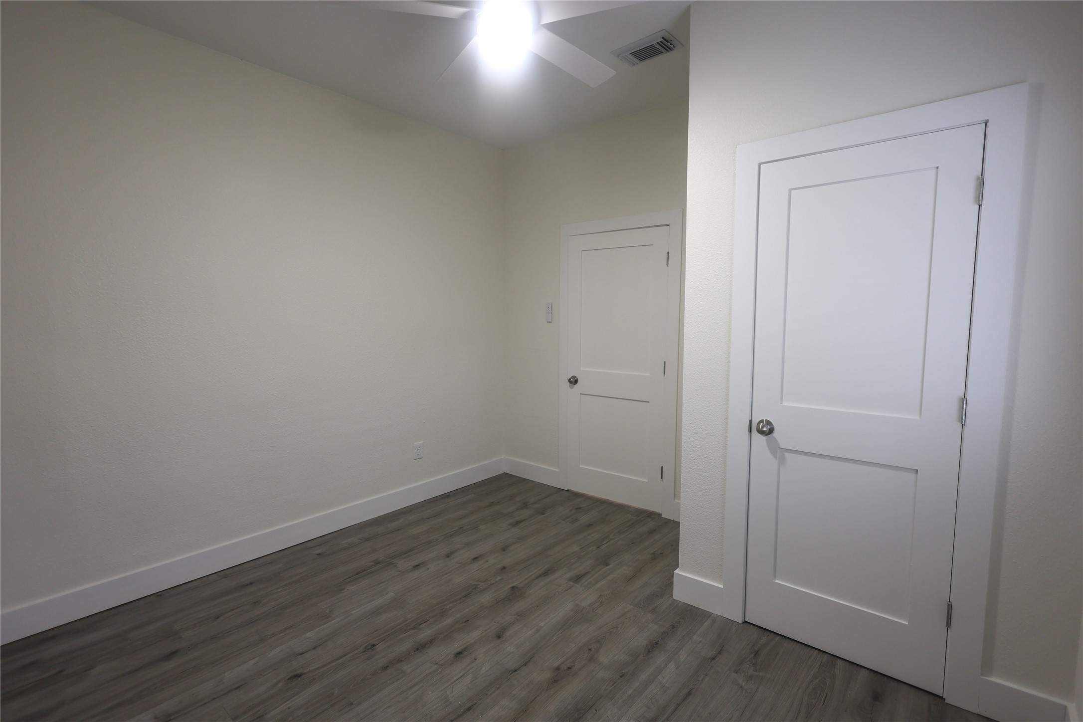 602 Higgins Street Humble, TX 77338 - Photo 30 of 39 a view of small space with wooden floor and closet