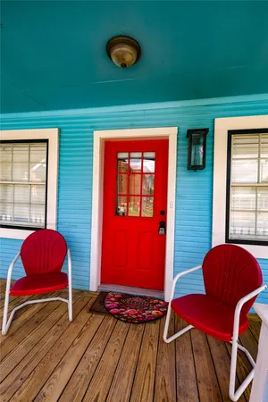 a view of a livingroom with furniture and window