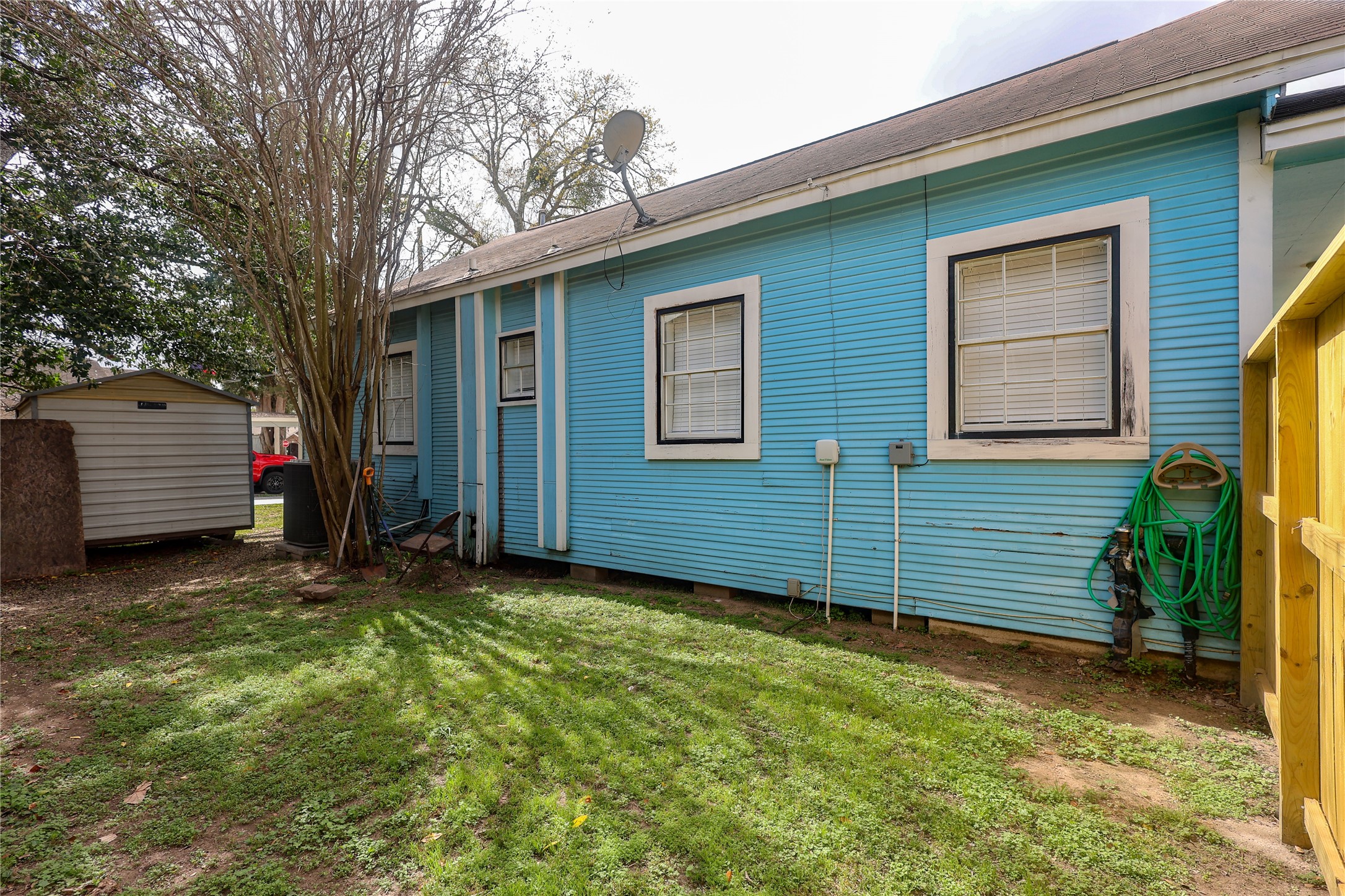 602 Higgins Street Humble, TX 77338 - Photo 35 of 39 a view of a house with a yard