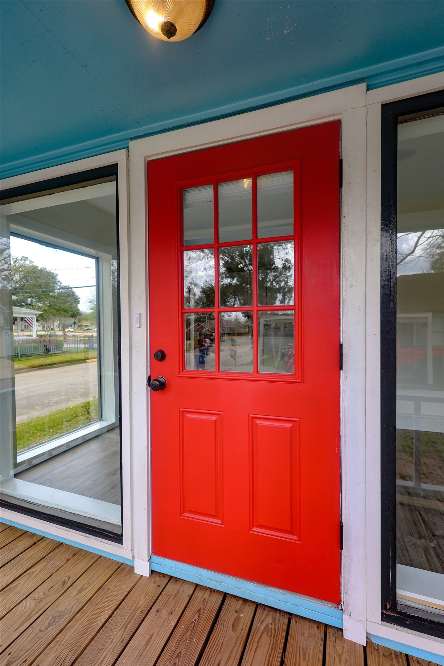 602 Higgins Street Humble, TX 77338 - Photo 37 of 39 a view of a room with wooden floor and windows