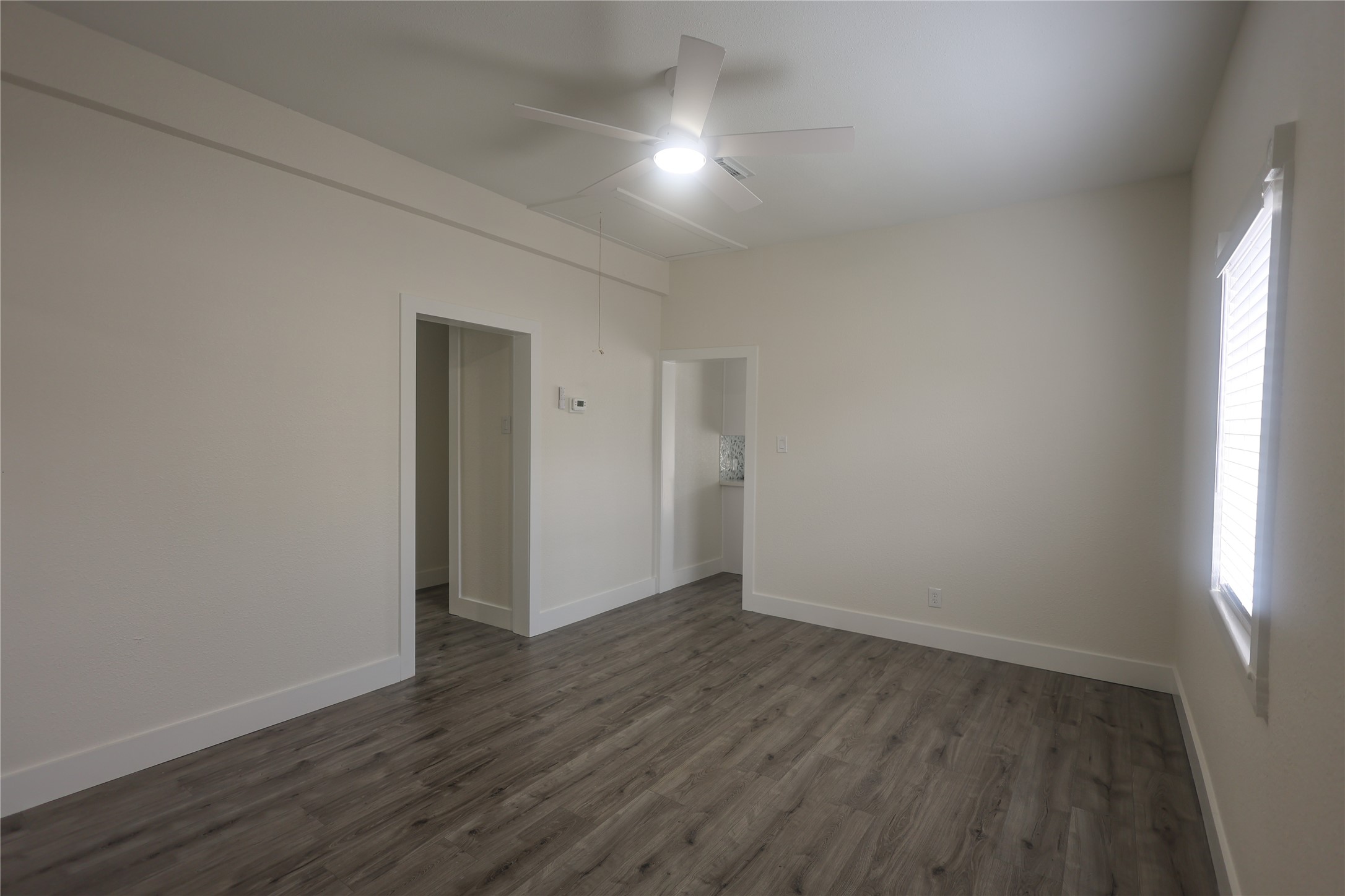 602 Higgins Street Humble, TX 77338 - Photo 9 of 39 wooden floor in an empty room