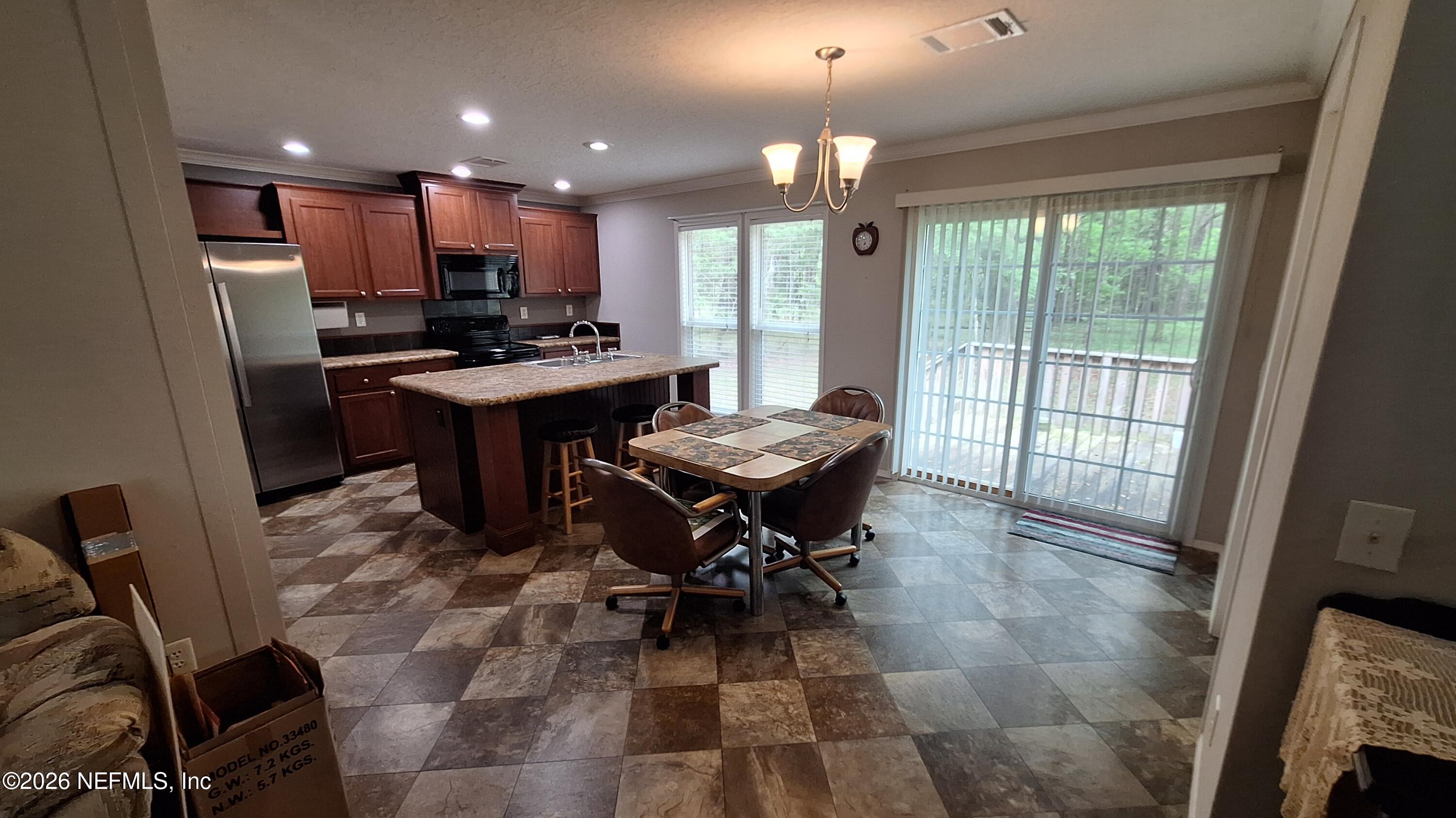 54144 Catherine Avenue Callahan, FL 32011 - Photo 4 of 50 View to Kitchen from Living Room