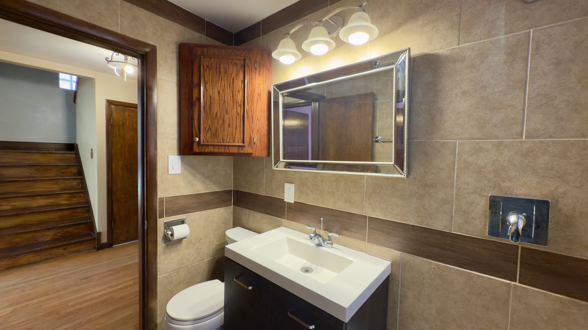 7127 South Ridgeway Avenue Chicago, IL 60629 - Photo 15 of 28 a bathroom with a sink toilet and shower