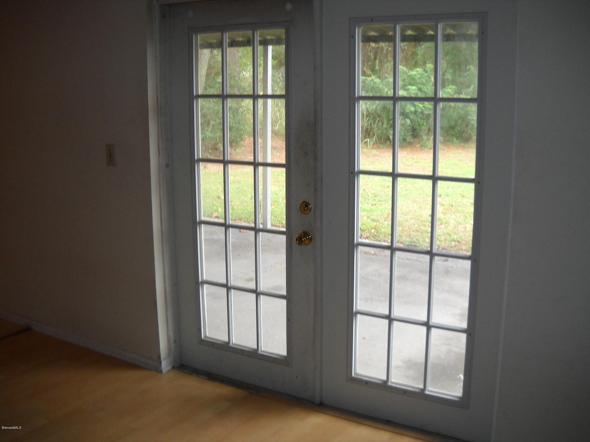 5529 Flint Road Cocoa, FL 32927 - Photo 13 of 15 Kitchen area with french doors