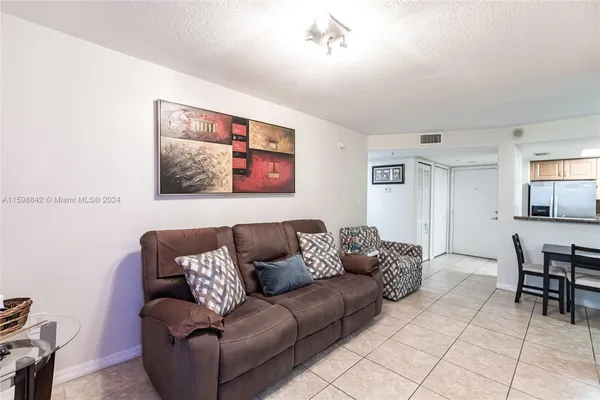 $330,000 | 1690 Southwest 27th Avenue, Unit 306, Miami, FL 33145