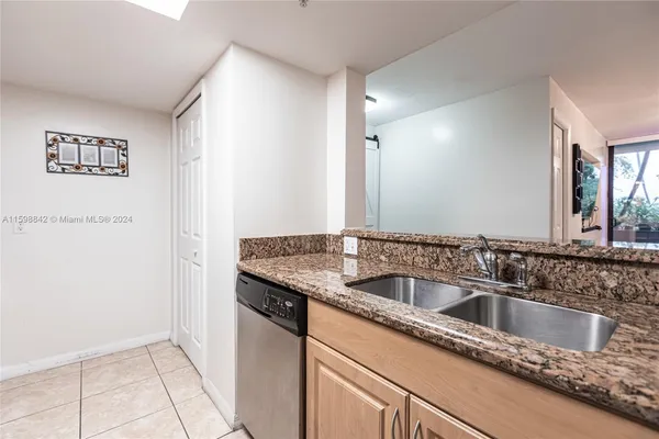 $330,000 | 1690 Southwest 27th Avenue, Unit 306, Miami, FL 33145