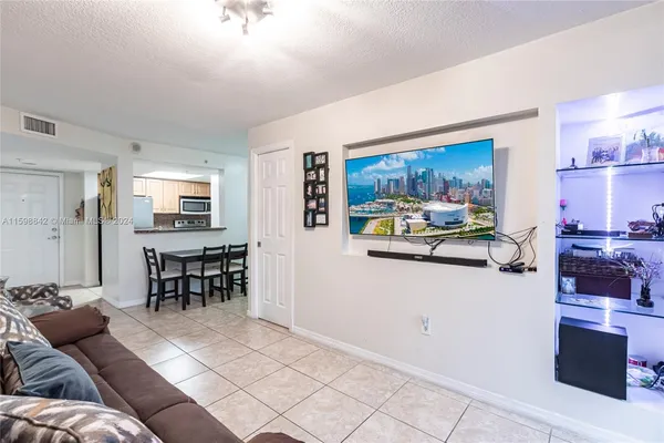 $330,000 | 1690 Southwest 27th Avenue, Unit 306, Miami, FL 33145
