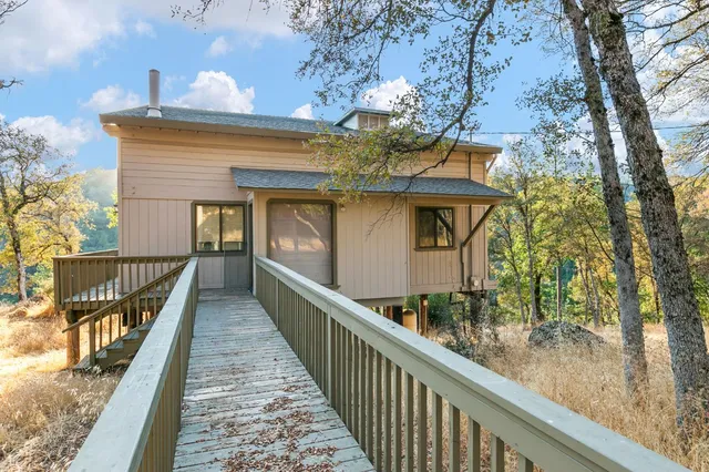 a view of a house with large windows