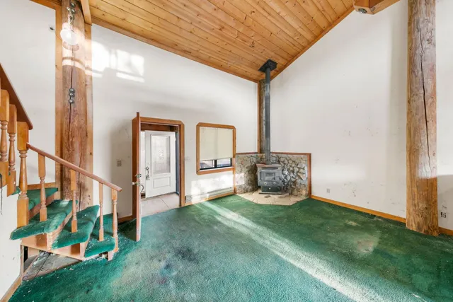 a view of an empty room and window