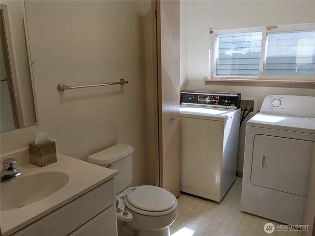 a bathroom with a sink and a toilet