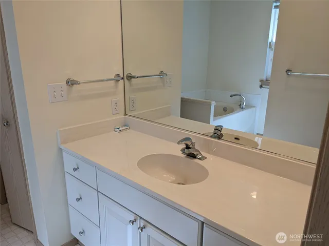 a bathroom with a sink and a tub