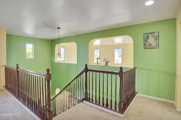 a view of a hallway with a porch
