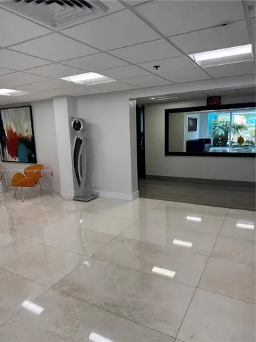 a white refrigerator freezer sitting in a kitchen