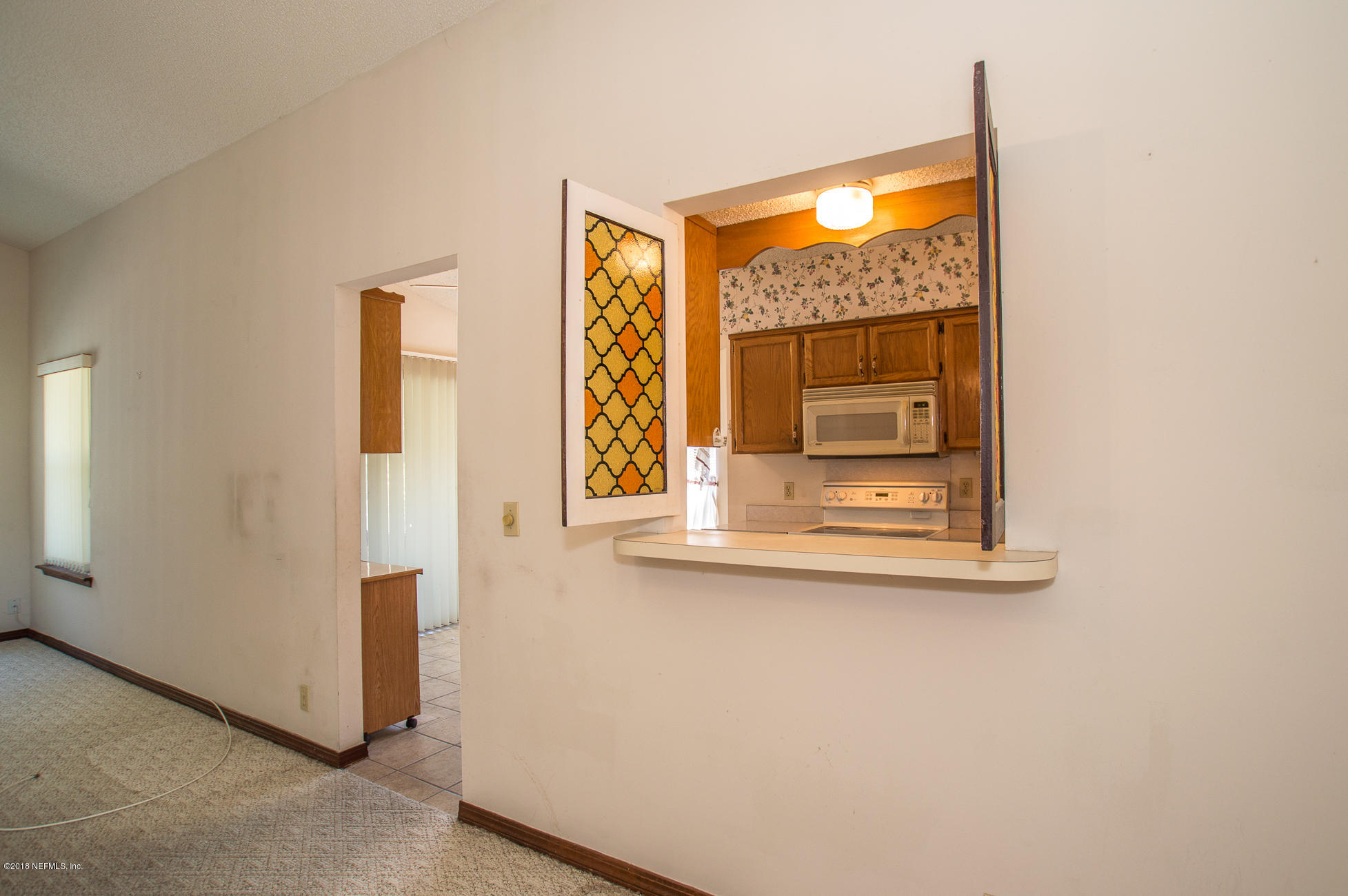 8185 Crosswind Road Jacksonville, FL 32244 - Photo 23 of 35 Pass Thru from Kitchen