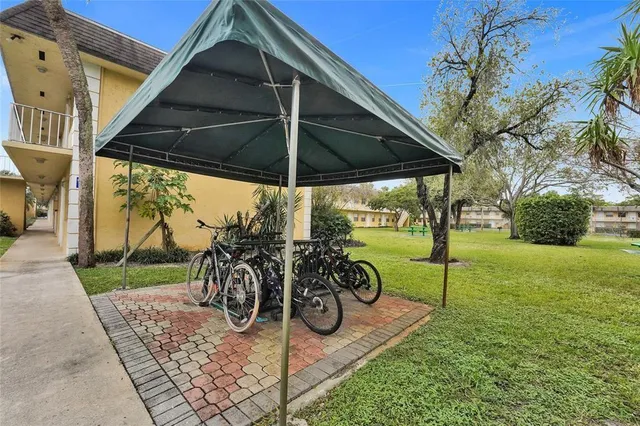 a view of a swimming pool with a balcony