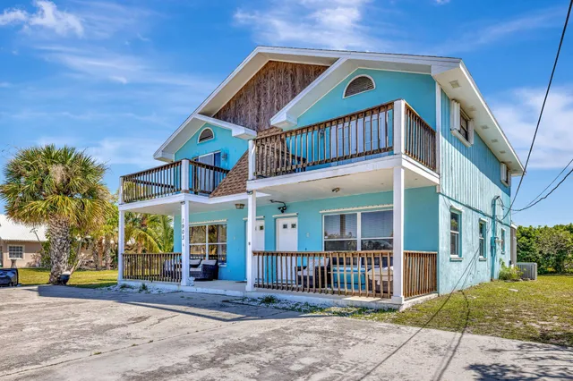 a front view of a house with a porch