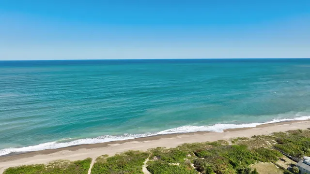 a view of an ocean from a balcony