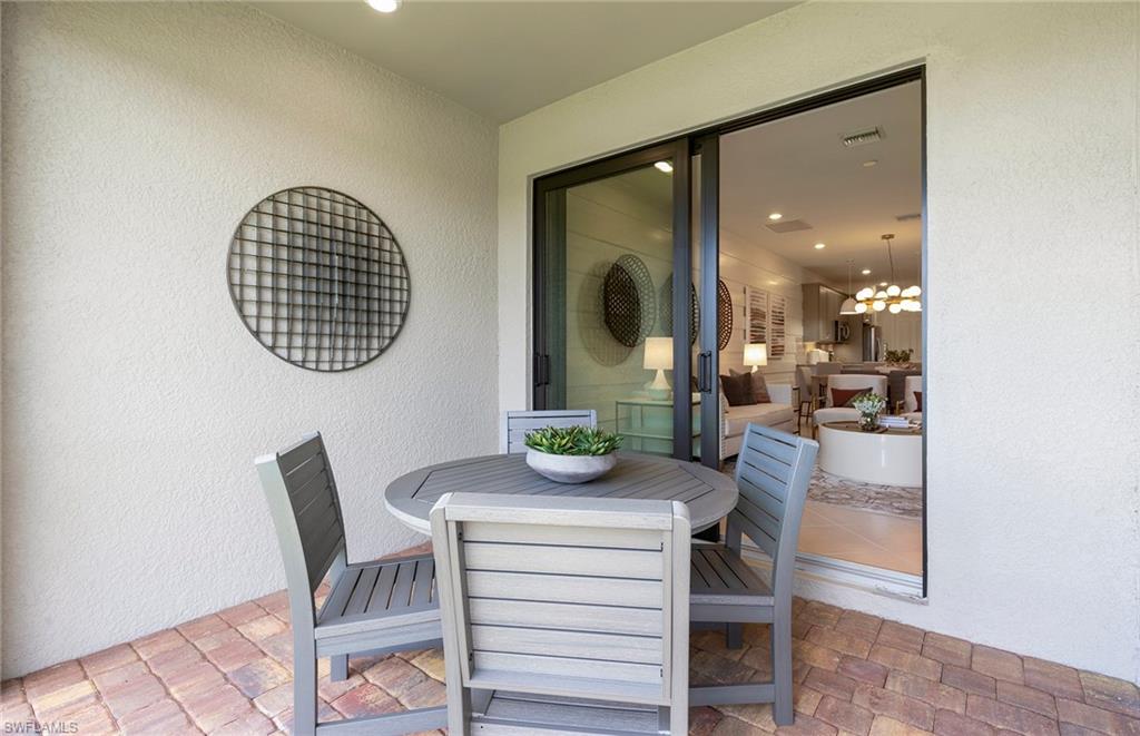 6426 Memorial Lane Ave Maria, FL 34142 - Photo 25 of 38 a view of a dining room with furniture