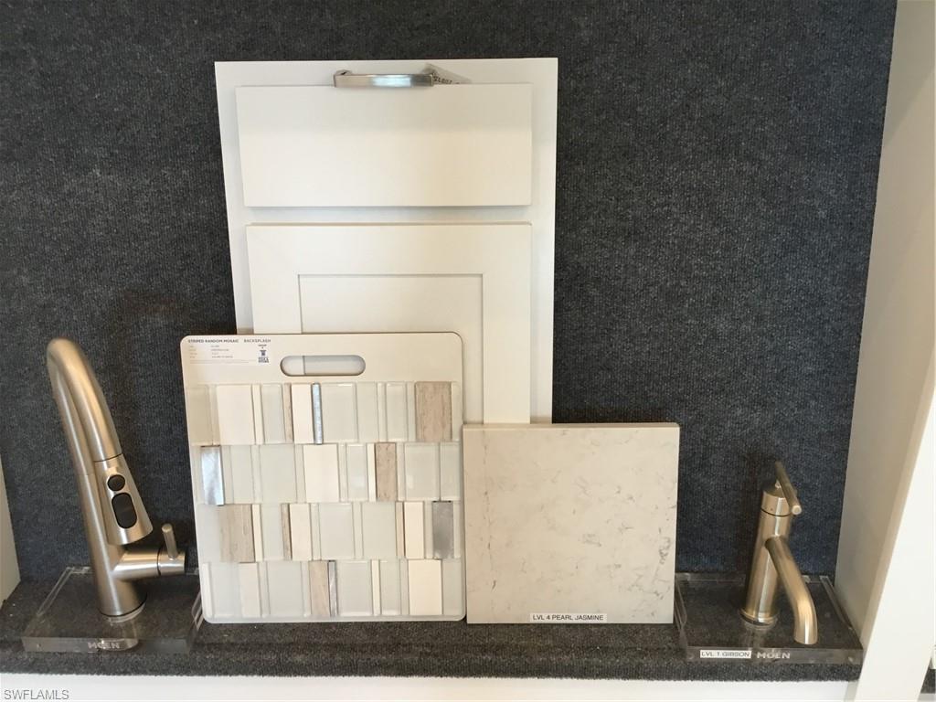 6426 Memorial Lane Ave Maria, FL 34142 - Photo 5 of 38 a utility room with dryer and washer