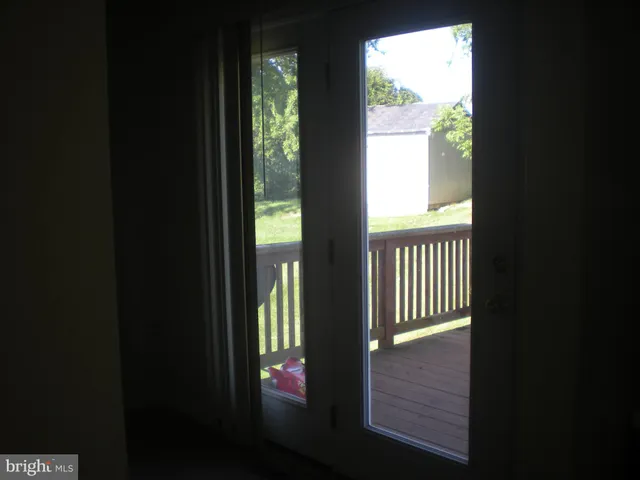 a kitchen with a sink cabinets and window