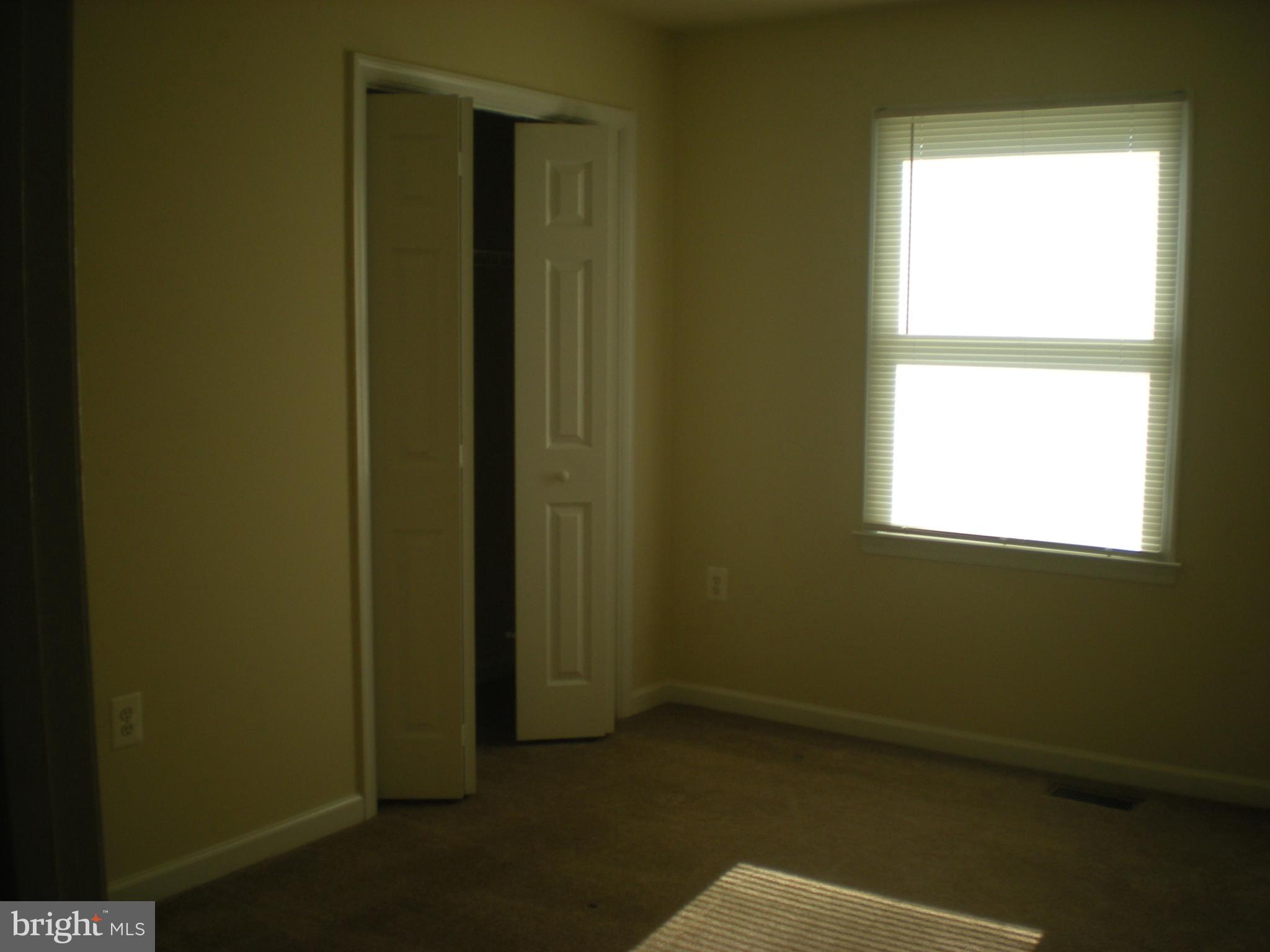 823 Snowfall Way Westminster, MD 21157 - Photo 20 of 23 a view of an empty room with a window