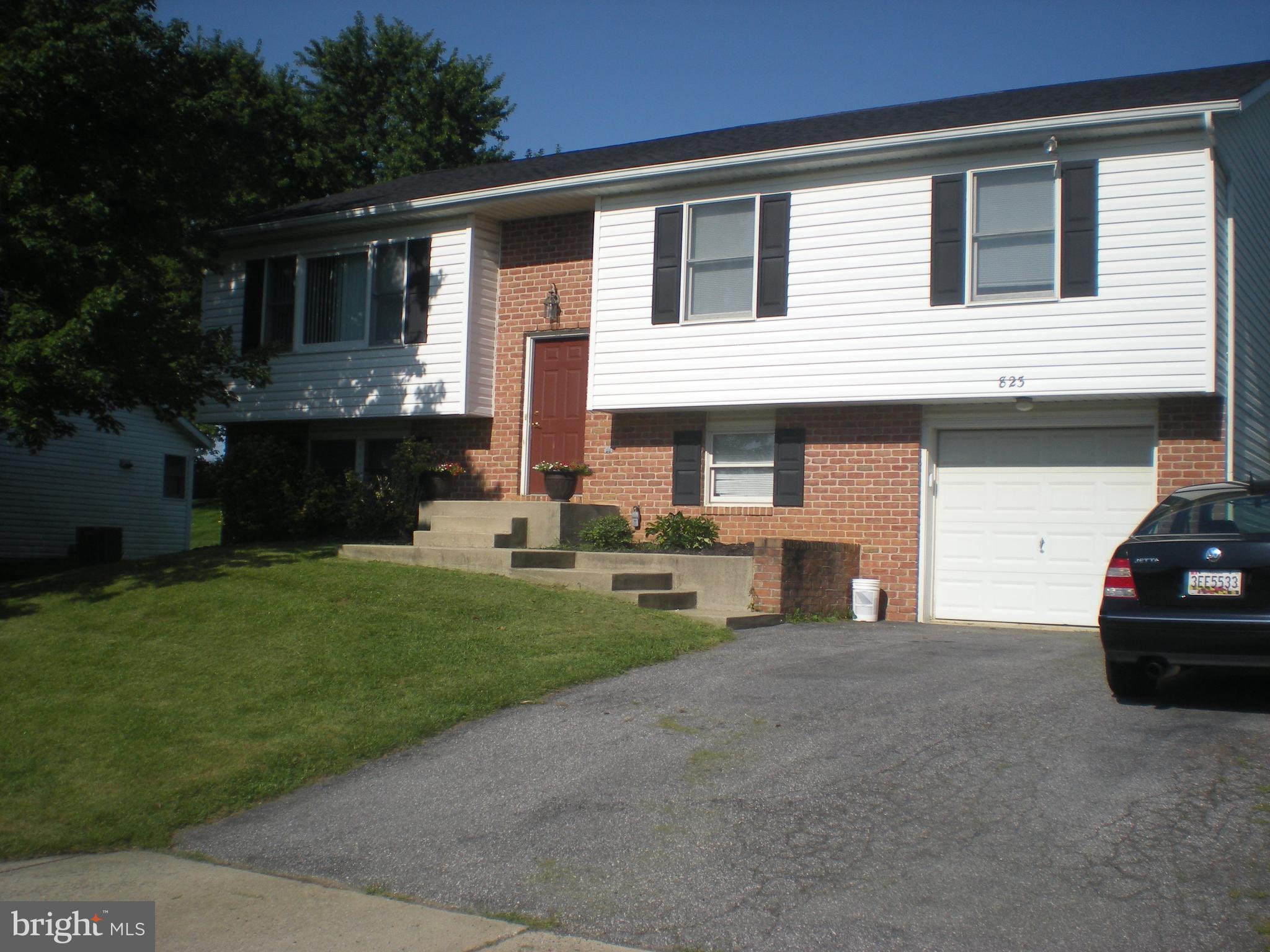 823 Snowfall Way Westminster, MD 21157 - Photo 2 of 23 a view of house that has a car park front of house