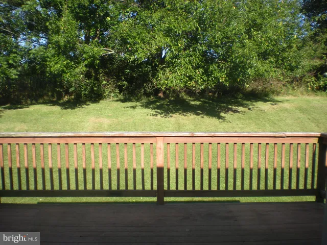 a view of a wooden fence