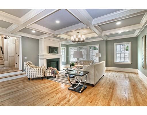 10 Russell Road Lexington, MA 02420 - Photo 11 of 29 a living room with furniture and a fireplace