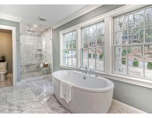10 Russell Road Lexington, MA 02420 - Photo 22 of 29 a bathroom with a bathtub and a shower
