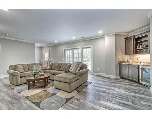 10 Russell Road Lexington, MA 02420 - Photo 23 of 29 a living room with furniture and a wooden floor
