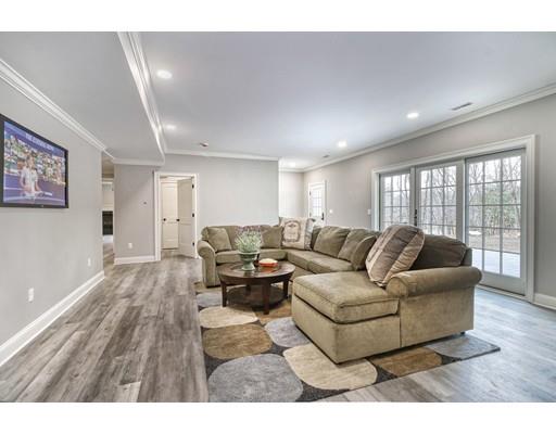 10 Russell Road Lexington, MA 02420 - Photo 24 of 29 a living room with furniture and a wooden floor