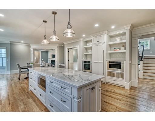 10 Russell Road Lexington, MA 02420 - Photo 6 of 29 a kitchen with stainless steel appliances granite countertop a stove oven and a refrigerator