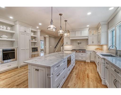 10 Russell Road Lexington, MA 02420 - Photo 7 of 29 a kitchen with a stove a sink and a refrigerator
