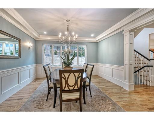 10 Russell Road Lexington, MA 02420 - Photo 9 of 29 a view of a dining room with furniture and chandelier