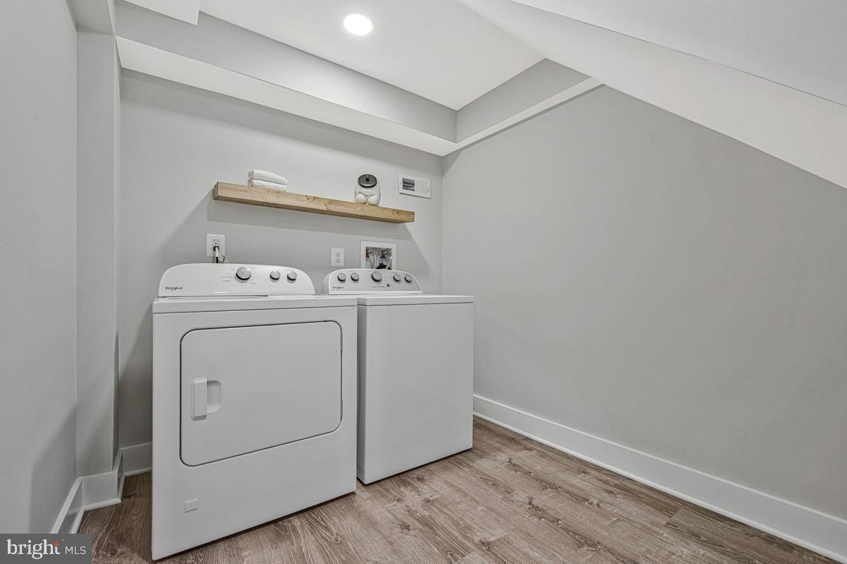 2105 Queens Chapel Road Mount Rainier, MD 20712 - Photo 27 of 33 a utility room with dryer and washer