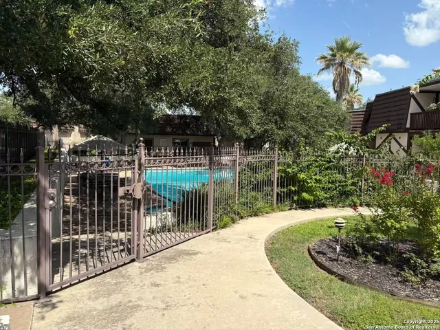 a view of a backyard with a garden