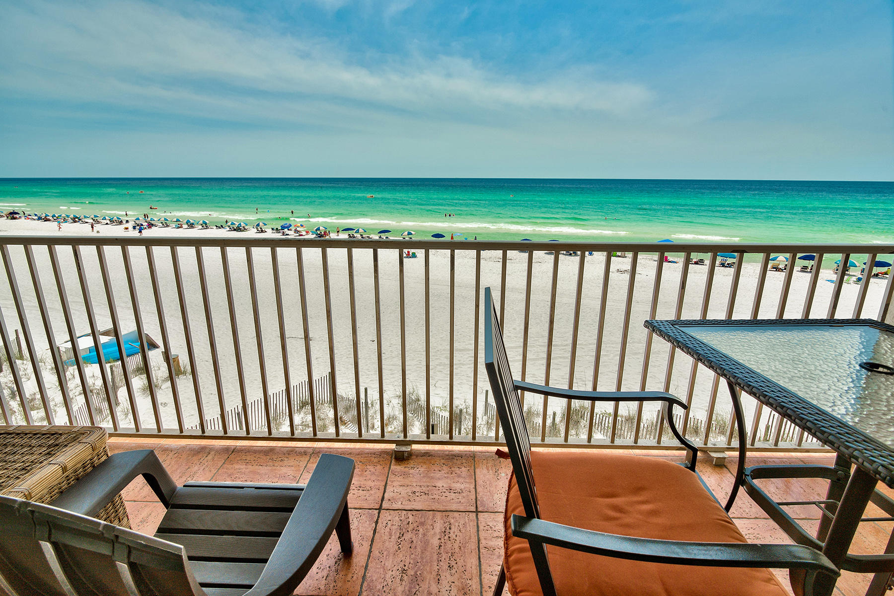 595 Eastern Lake Road, Unit 108 Santa Rosa Beach, FL 32459 - Photo 1 of 26 a view of a chair and table on the roof deck