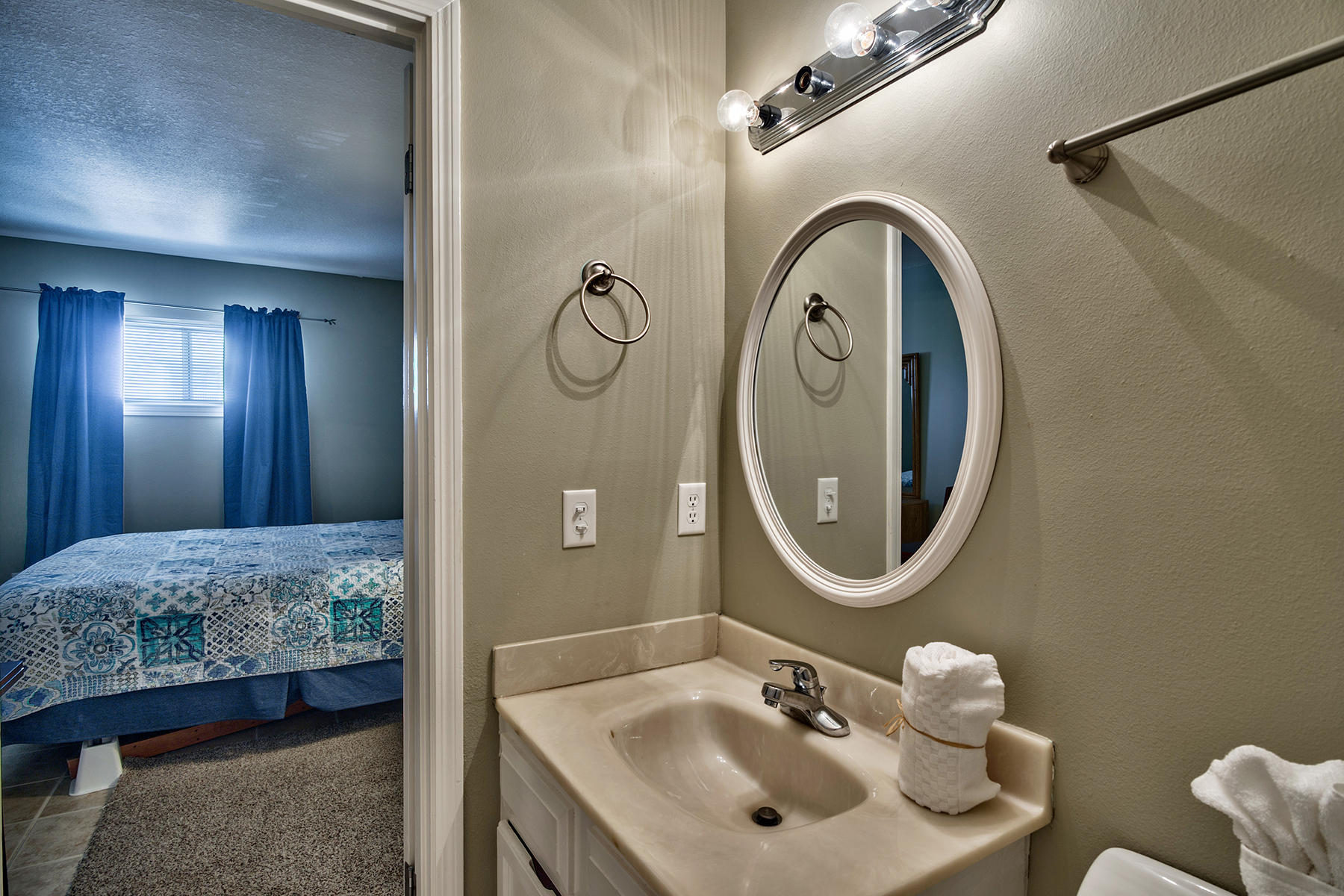 595 Eastern Lake Road, Unit 108 Santa Rosa Beach, FL 32459 - Photo 11 of 26 a bathroom with a sink and a mirror
